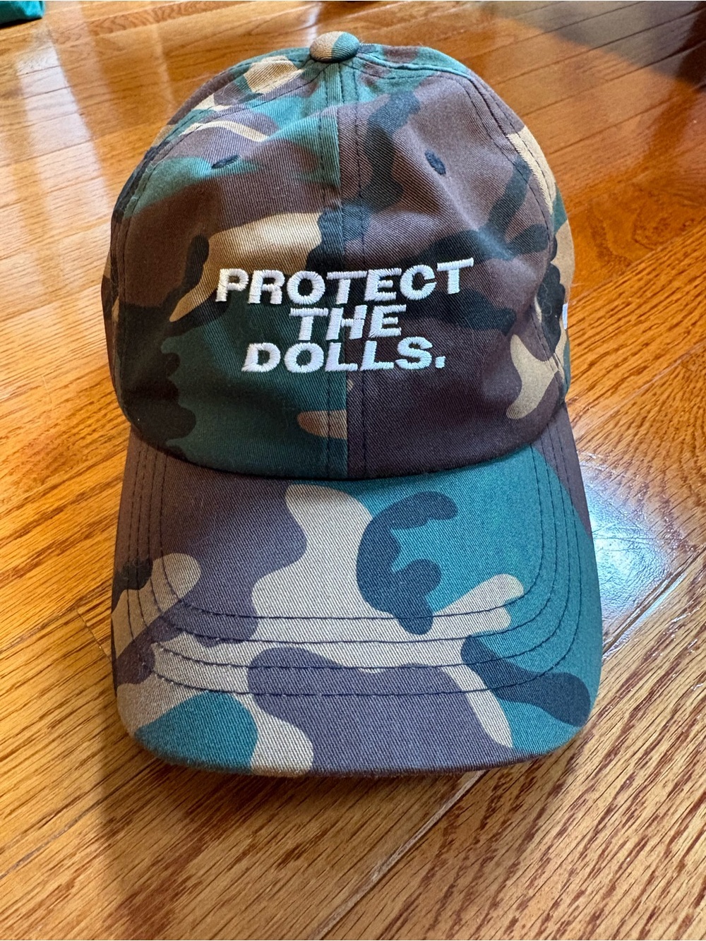 “Protect The Dolls” Camo Dad Cap